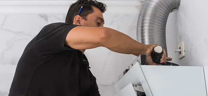 Precision In-wall Dryer Vent Cleaning & Rerouting Corrections in Fairhope, AL
